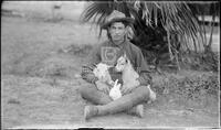 Soldier with goats and rabbit