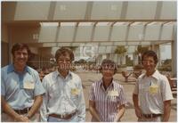 Photograph of Alan Lambert (far left), M. Bruce Abrahamse, Mary Embry-Waldrop, and Thomas "Tom" Hoover