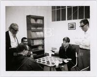 Photograph of George Yuri Rainich (far left), Lawson, Howard, and Farras