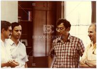 Photograph of Ciprian Foias, Roger Temam, Charalambos Aliprantis and Zbiginew Semadeni, September 1980