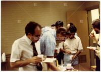 Photograph of a gathering at the Indiana University math department lounge, 1981