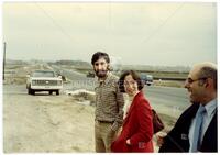 Photograph of George and Mrs. Mills with Seymour Schuster, April 1983