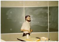 Photograph of a lecturer at a Canadian Operator Symposium, May 1983