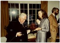 Photograph of Wells, Virginia Halmos and John Ewing, 1983