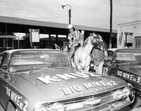 Big Mike and cowgirl, no. 31247-4; Radio/TV