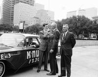 Ken Grant, mayor and new police cars, no. 32011-1; Radio/TV