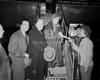 Anne Baxter arrival with Alfred Hitchcock and Dick Gottlieb, no. 19744; Interstate