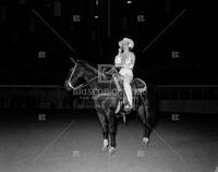 Lady on horse, no. 4235; Rodeo and livestock
