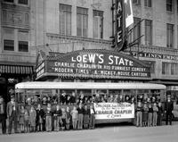 Ext., "Modern Times"' and group of men, no. 1283; Loew's Theater