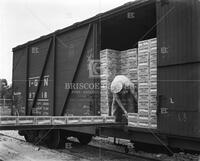 Grand Prize, loading boxcar, no. 4333; Beer and bars