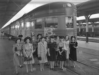 Women at train station, no. 4635