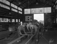 Men in lumber yard or steel mill, no. 573