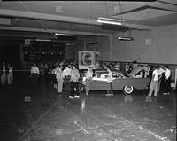 Crowds at showing of new Ford models for A.S. Bloch
