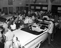 Crowds at showing of new Ford models for A.S. Bloch