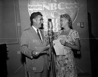 Man and woman in KPRC studio, no. 13604; Radio and television