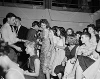 Photograph of crowd attending performance by Elvis Presley