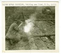 Seine River Crossing, welding new line, D Co., 359th