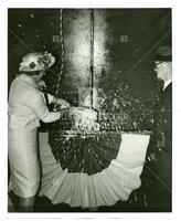 Veta Moore Davis helping to launch the tanker Esso Baltimore, April 28, 1960