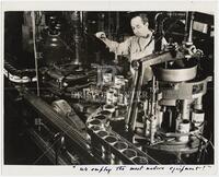 Man Filling Quart Cans with Mobiloil