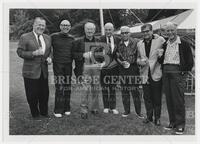 Athelstan Spilhaus posing with a group of men