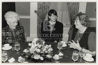 Ann Richards, Janet Reno, and Molly Ivins at a table