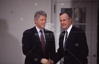 Bill Clinton meets with George Bush