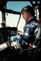 Young man in cockpit