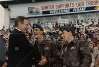 [President Bush with Air Force members]