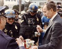 [President Bush with police officers]