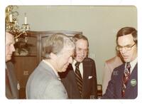 Photograph of Jimmy Carter, Bernard Rapoport, and Charles Terrell at Carter for President event