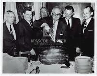 Photograph of Wrigth Patman, Clark Thompson, Joe Kilgore, Grover Sellers, J.R. Ramey, and Jack Brooks with watermelon, July 24, 1963