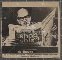 Newspaper clipping from the Beaumont Enterprise of Jack Brooks smoking a cigar during the Nixon impeachment hearings, July 26, 1974