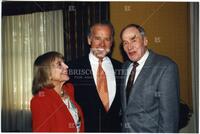 Audre and Bernard Rapoport posing with Joe Biden