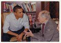 Barack Obama sitting and talking with Bernard Rapoport