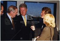 Bernard Rapoport, Bill Clinton, unidentified man, and Audre Rapoport talking