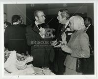 Jim Wright, Bernard Rapoport, and Audre Rapoport talking at reception