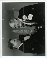 Al Gore shaking hands with Bernard Rapoport