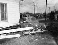 Car goes into living room