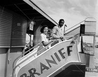 Boarding Braniff plane