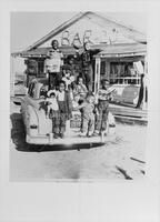 Photo of children in front of Bar 20 in Mineola, Texas