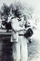 Unidentified man with boy