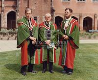 Edsgar Dijkstra (left) and 2 unidentified men in commencement regalia