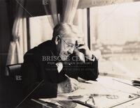Frederick L. Fuller at his desk
