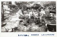 [Group photograph, outdoors:] Engstrom, Warner, Campaigne