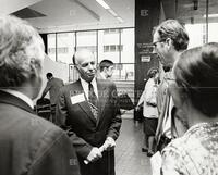 Outside R. L. Moore Hall 4.102 before dedication (Professor R. H. Bing, UT Austin (facing camera), and Professor C. E. Burgess from Utah, profile with others in background. (16)