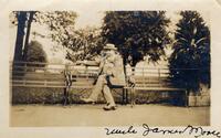 James W. Moore [uncle of R. L. Moore] on a park bench