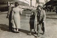 Woman with young boy at a German port [H. S. Wall's wife and son, H. Richard Wall?]