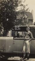 C. A. Truesdell III with his mother's first car, a Franklin in front of his grandparents' house at 1984 Oak St.