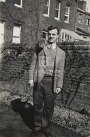 C. Truesdell and his cat, Cesky [?], in the garden of the house owned by Selfrida Fowler, where he and his mother lived at the end of their stay in Oxford.