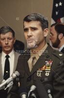 Col. Oliver North, at lawyer